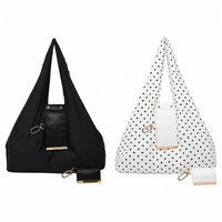 White polka dot bag