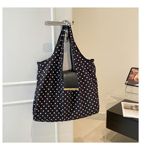 Polka dot black bag